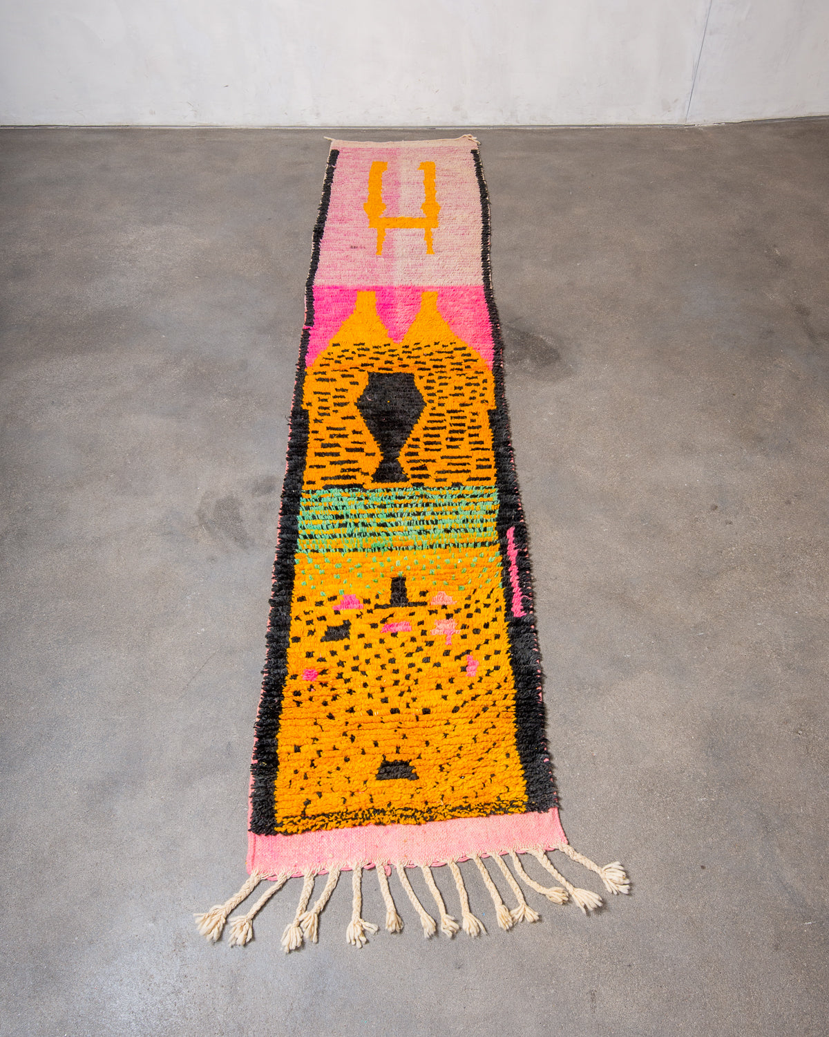 Modern, designer, handcrafted Berber runner rug from Morocco. Beniourain carpet with beautiful colours and patterns and fluffy wool texture.